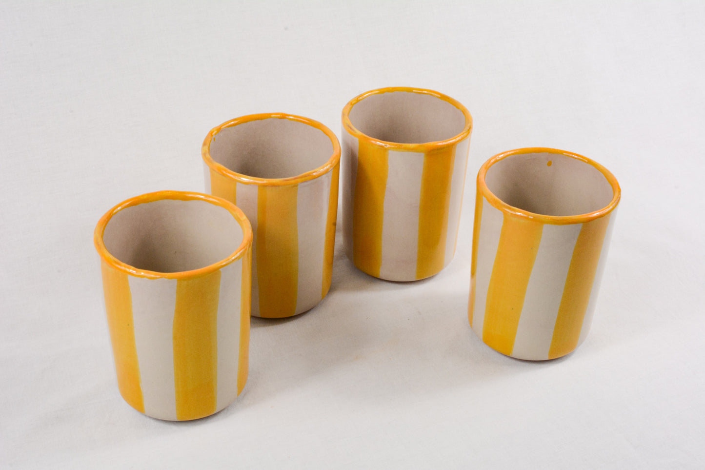 Pack 4 vasos a rayas amarillos